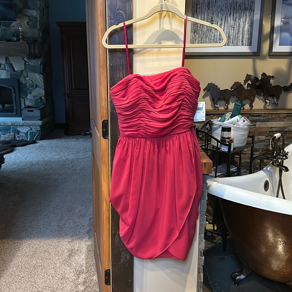 Never worn NWT adorable red cocktail dress. Great for homecoming, prom etc…